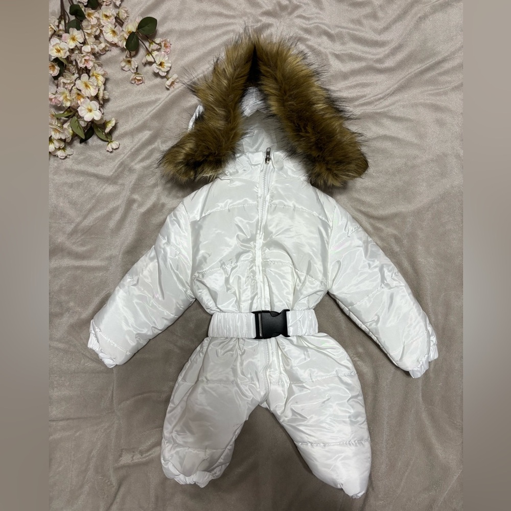 white baby snowsuit with faux fur hood